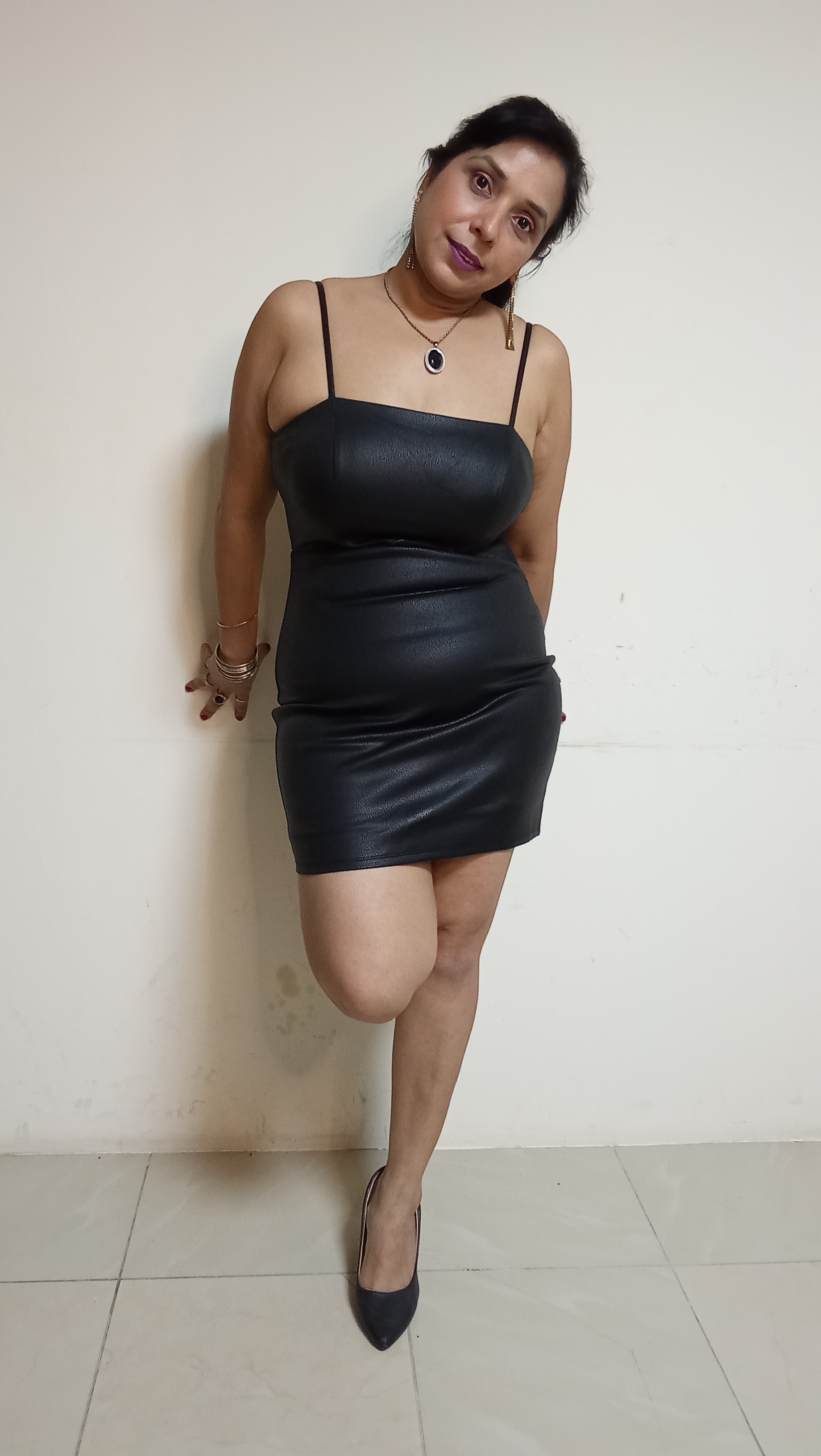Midnight Onyx Faux-Leather Mini Dress with Sheer Mesh Waist Cut-Out