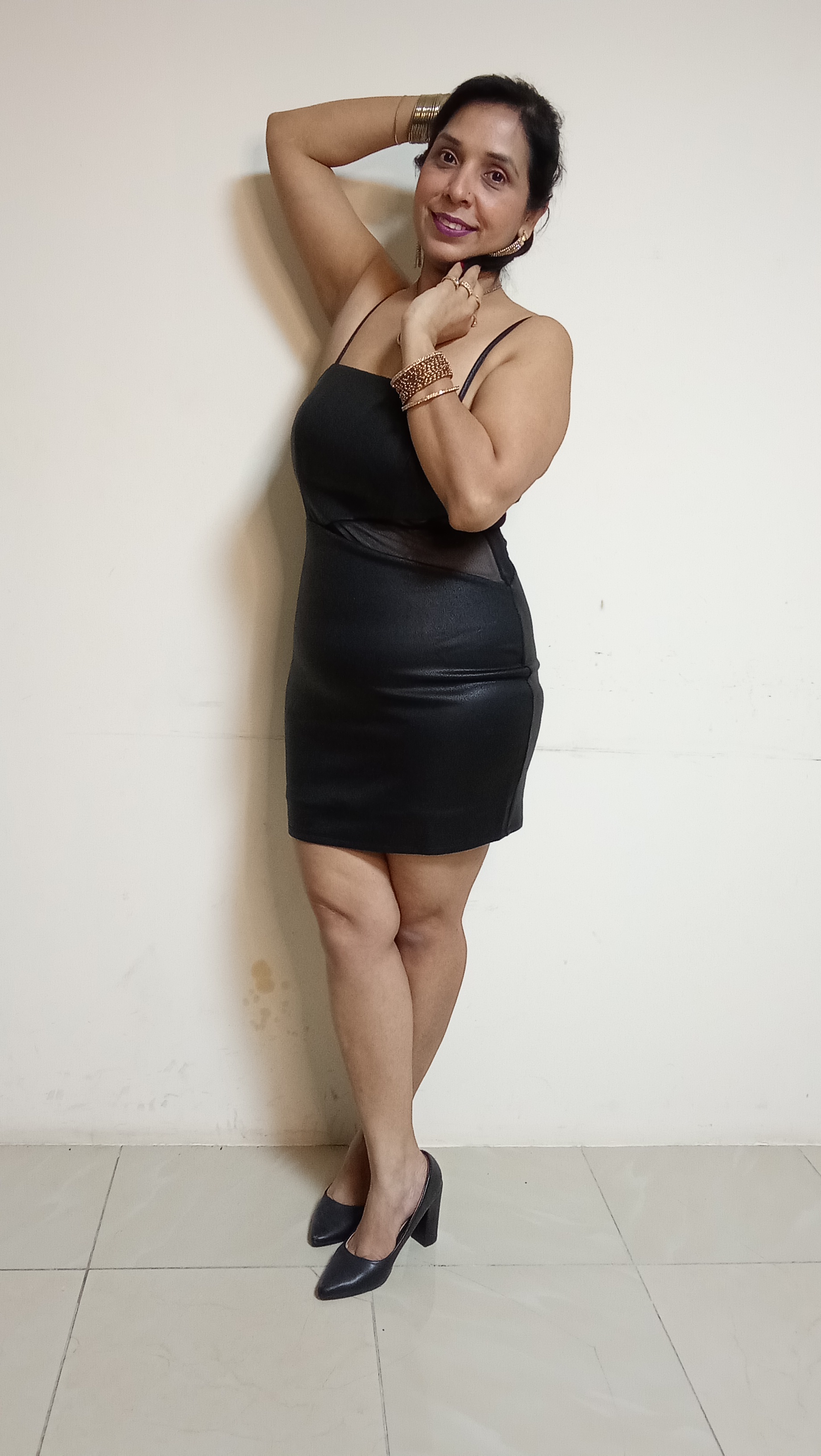 Midnight Onyx Faux-Leather Mini Dress with Sheer Mesh Waist Cut-Out