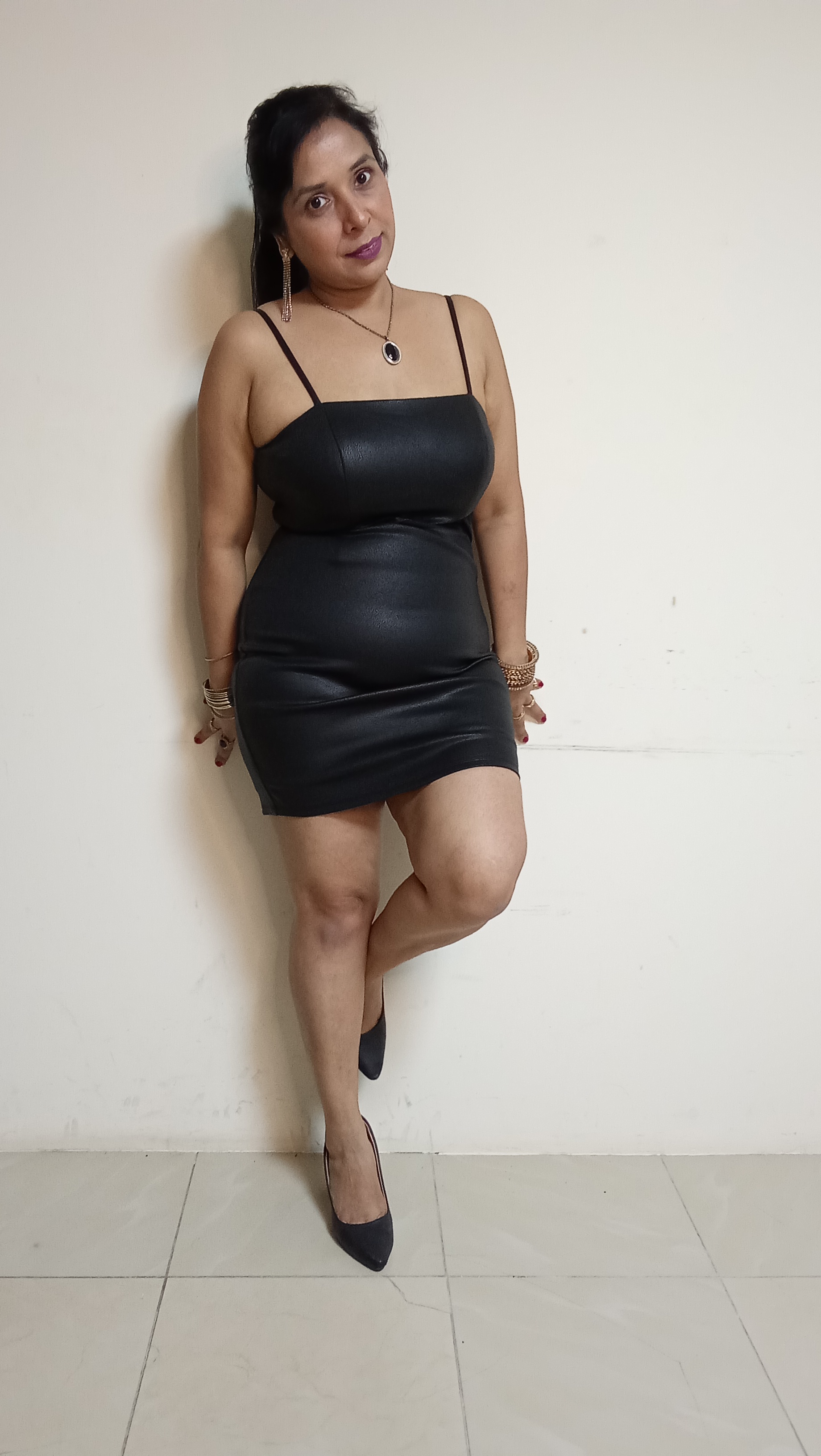 Midnight Onyx Faux-Leather Mini Dress with Sheer Mesh Waist Cut-Out