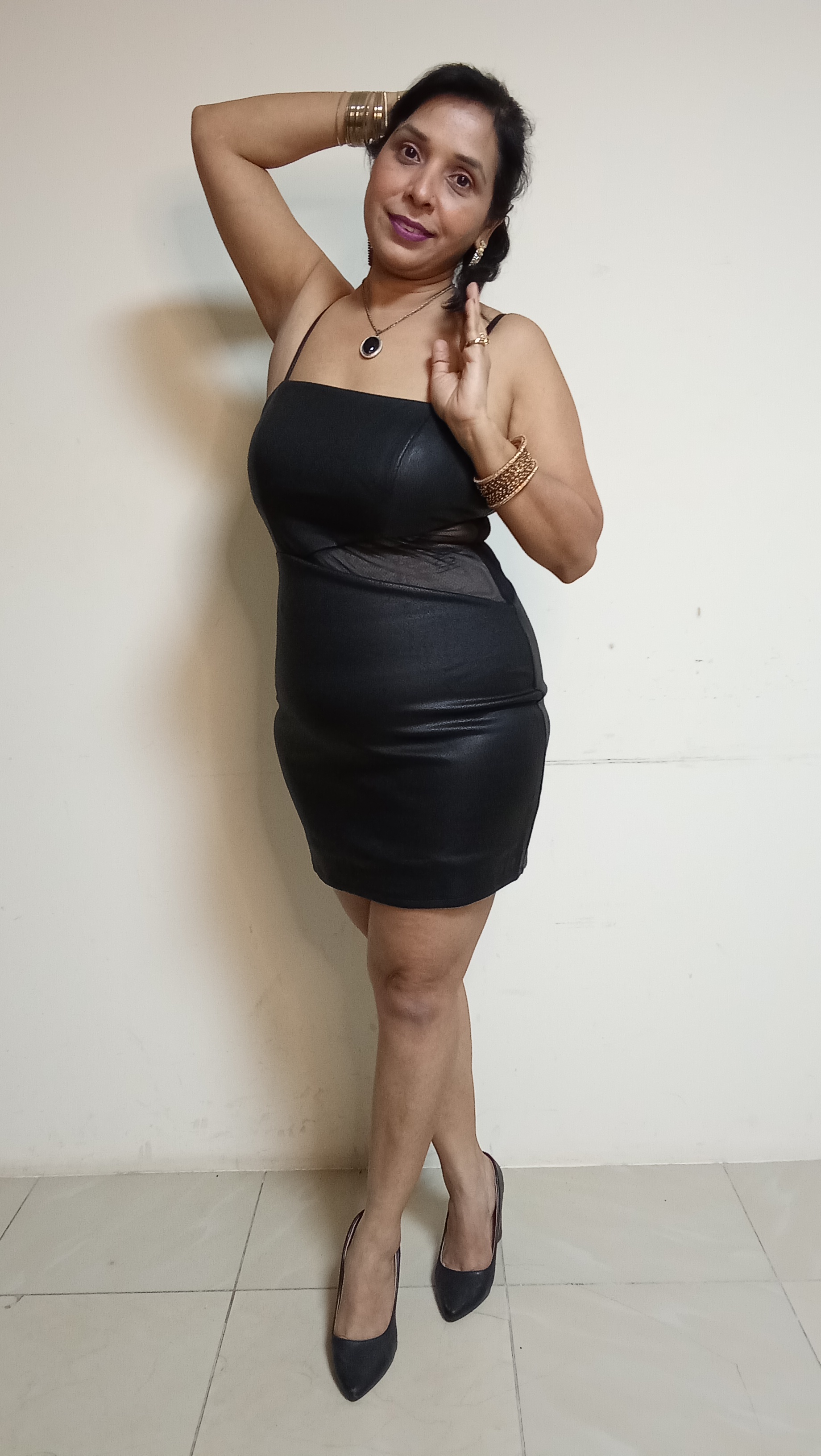 Midnight Onyx Faux-Leather Mini Dress with Sheer Mesh Waist Cut-Out